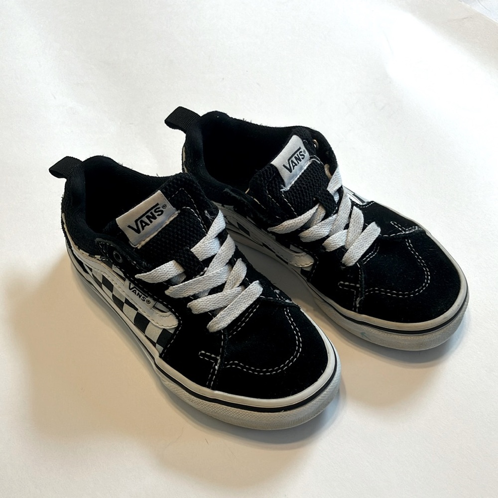 Gently used kids Vans. Size 12. Classic style. Worn a few times. Black and white